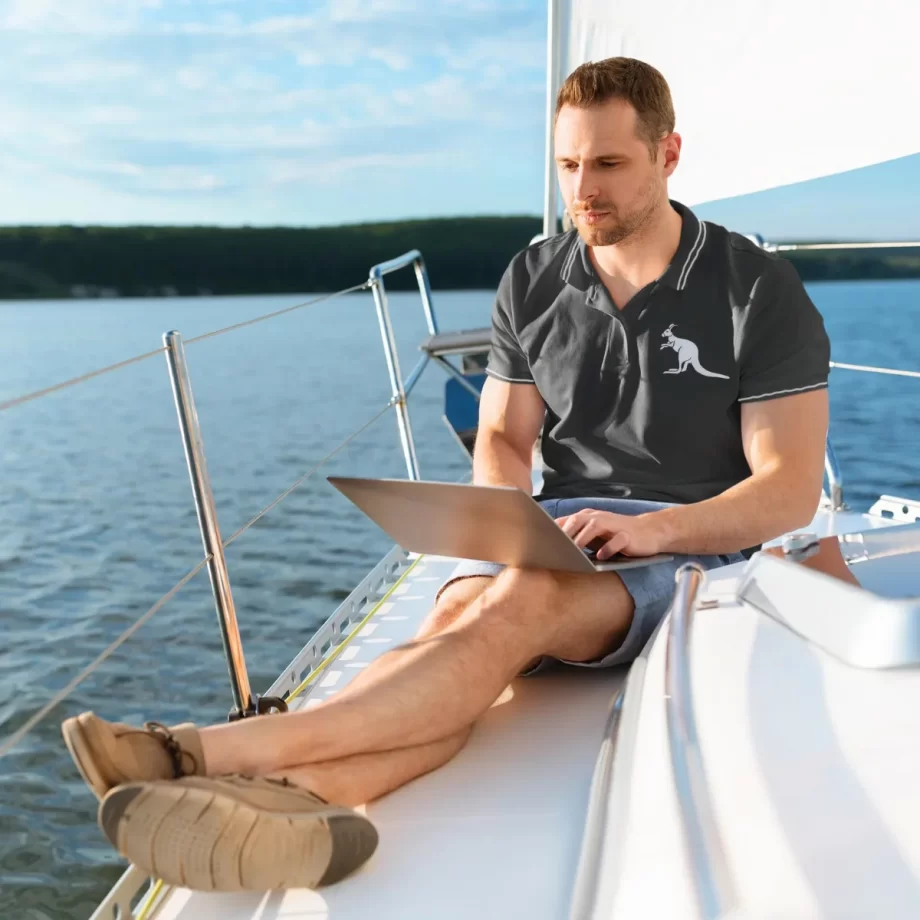 "Exclusive Australian Pride Polo Shirt in sleek black cotton, a timeless expression of heritage."