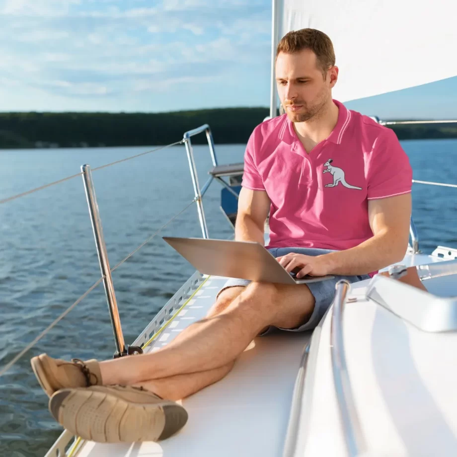 "Exclusive Australian Pride Polo Shirt in striking hot pink cotton, a stylish heritage choice."