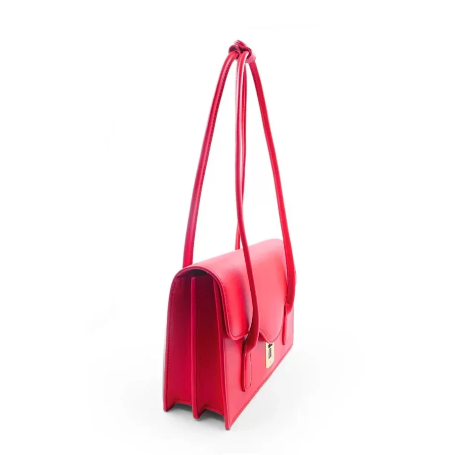 Scarlet Elegance Handbag: A vibrant red handbag featuring a sleek design, gold-toned clasp, and a patterned fabric handle, embodying elegance and style.